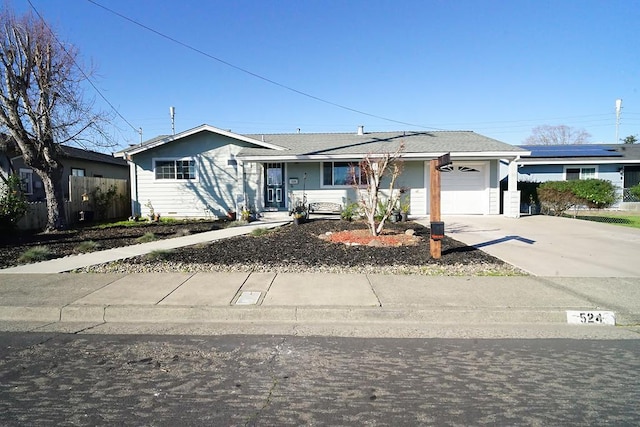 ranch-style home featuring a garage