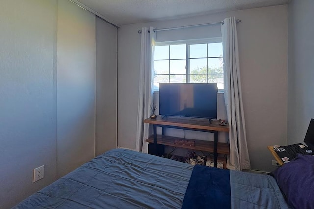 bedroom with a textured ceiling