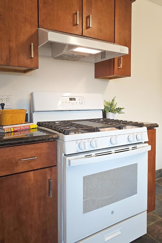 kitchen with white gas range