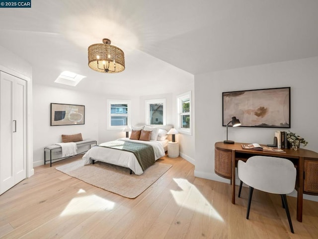 bedroom with light hardwood / wood-style flooring