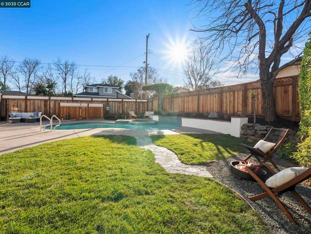 view of yard with a patio area, a swimming pool with hot tub, and an outdoor living space