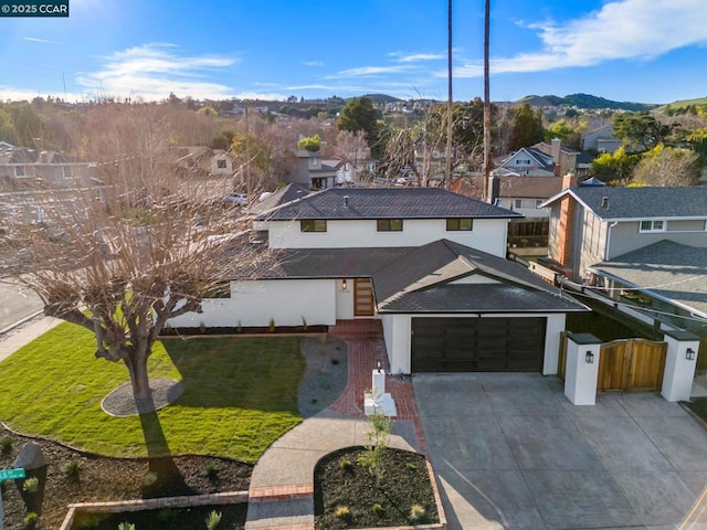 birds eye view of property featuring a mountain view