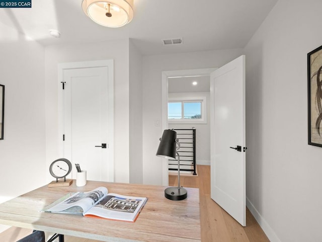 office area with light wood-type flooring