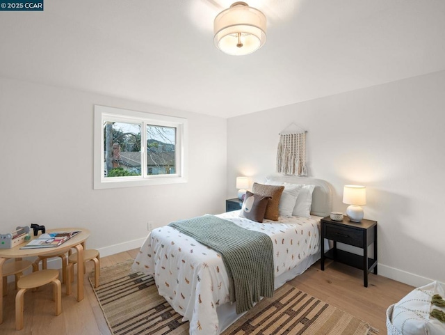 bedroom featuring light hardwood / wood-style floors