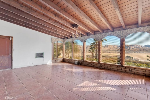 unfurnished sunroom featuring lofted ceiling with beams, wooden ceiling, and a chandelier