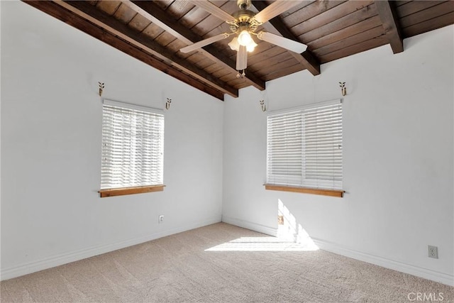 unfurnished room with light colored carpet, ceiling fan, lofted ceiling with beams, and wooden ceiling