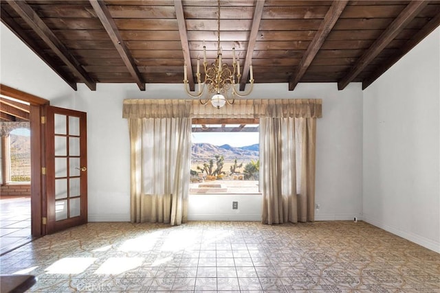 unfurnished dining area with wood ceiling, lofted ceiling with beams, a notable chandelier, french doors, and a mountain view