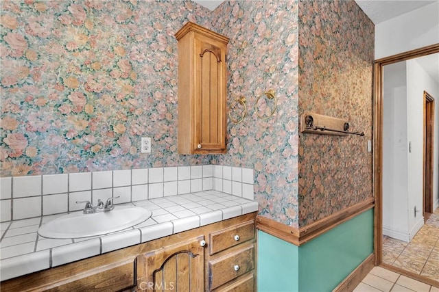 bathroom with vanity and tile patterned floors