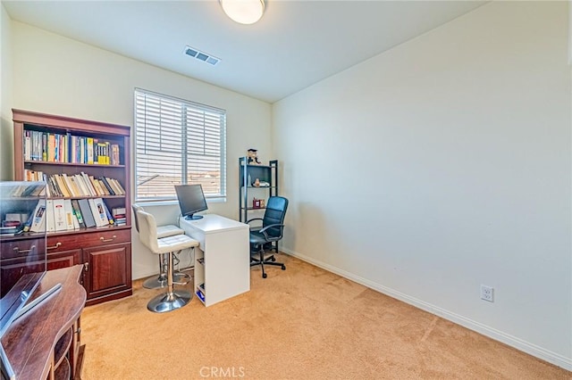 office area with light colored carpet