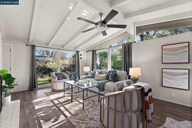 sunroom / solarium featuring ceiling fan and vaulted ceiling with beams