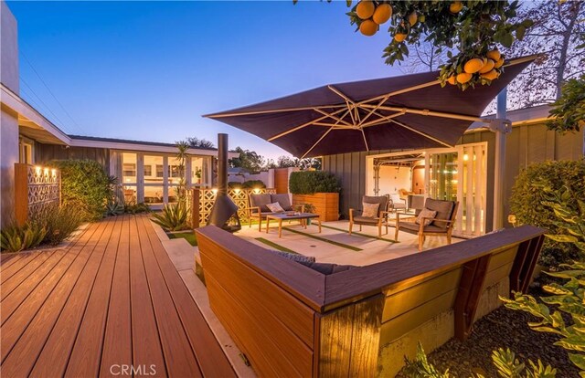 view of deck at dusk