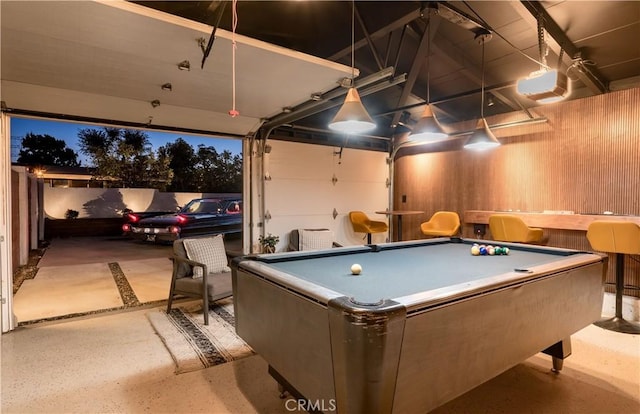 game room featuring wood walls and billiards