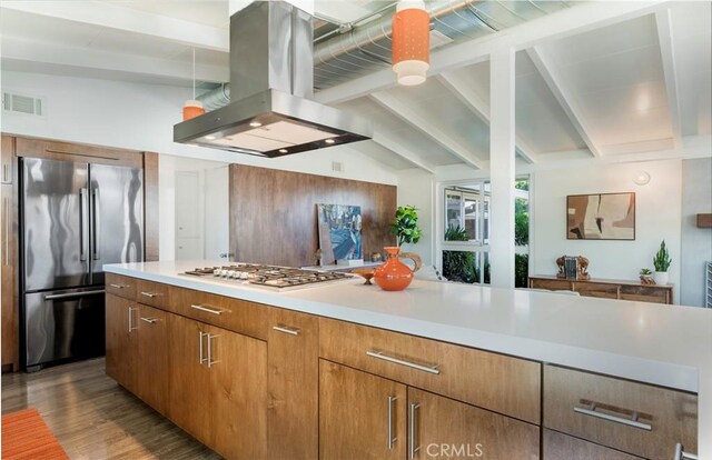 kitchen featuring stainless steel appliances, lofted ceiling with beams, island range hood, and dark wood-type flooring