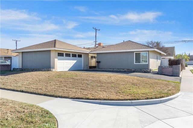 ranch-style home with a front lawn