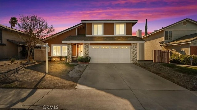 view of front of home featuring a garage