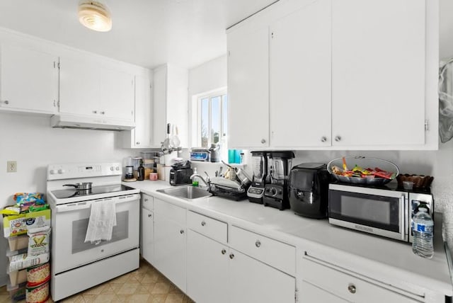 kitchen with white cabinetry, sink, and white electric range oven