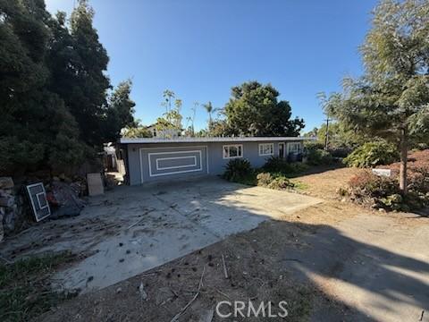 ranch-style home with a garage