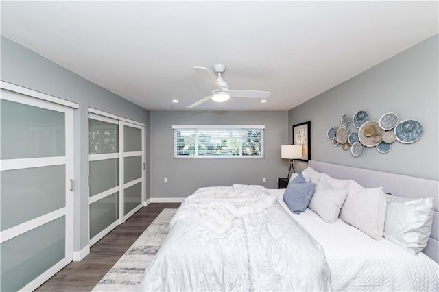 bedroom featuring ceiling fan and dark hardwood / wood-style flooring