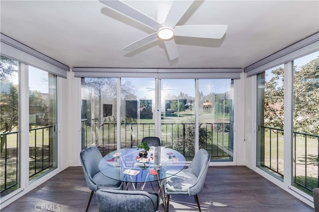 sunroom / solarium with ceiling fan