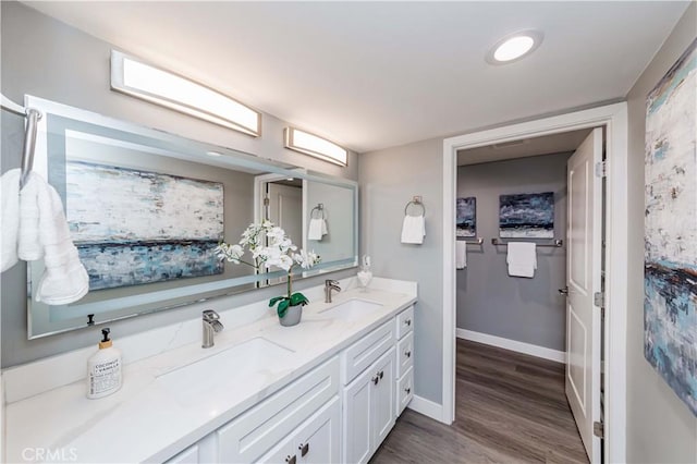 bathroom featuring vanity and hardwood / wood-style floors