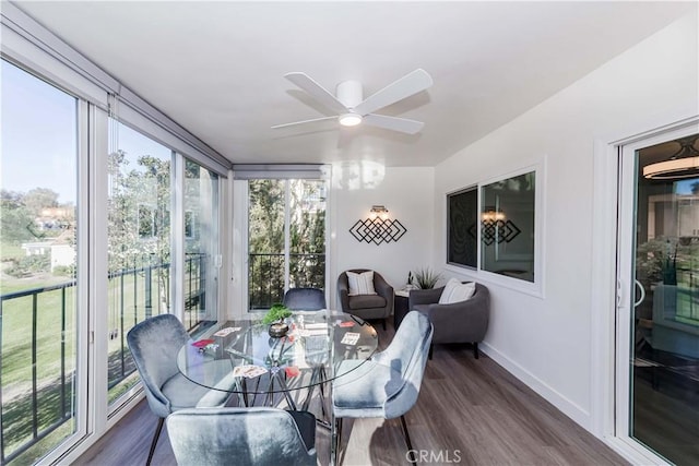 sunroom / solarium with ceiling fan and plenty of natural light