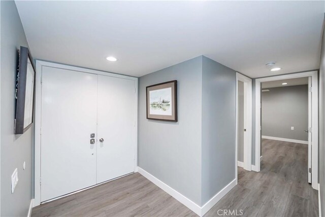 entryway with light hardwood / wood-style floors