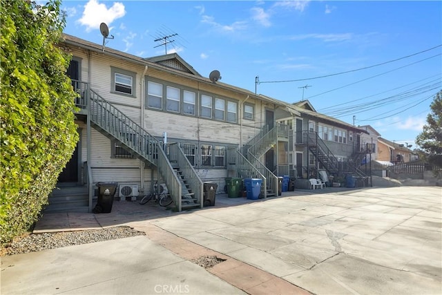 back of property with a patio area