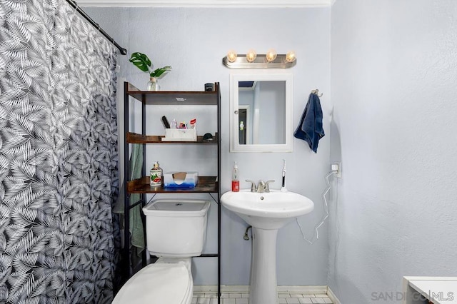 bathroom featuring toilet