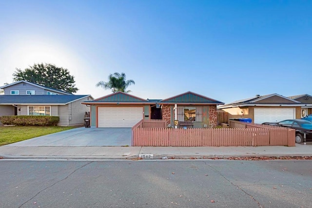 ranch-style home featuring a garage