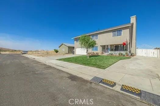 view of front of property with a front lawn