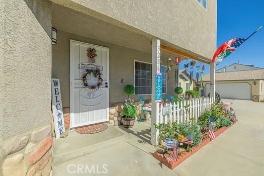 property entrance with a garage