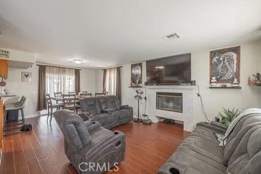 living room with dark wood-type flooring