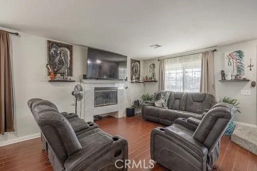 living room featuring dark hardwood / wood-style floors