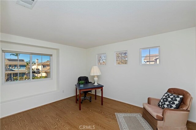 office area featuring hardwood / wood-style floors