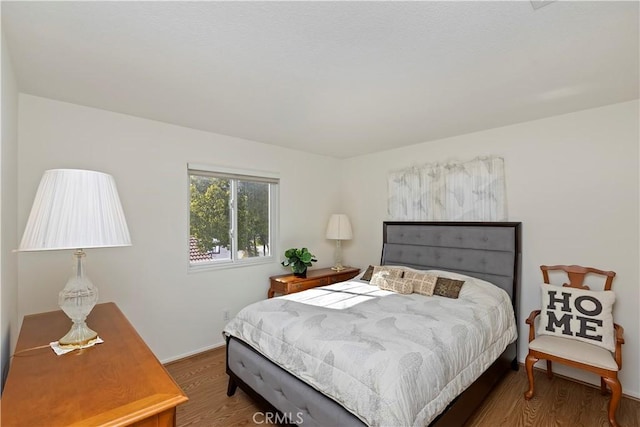 bedroom featuring hardwood / wood-style flooring