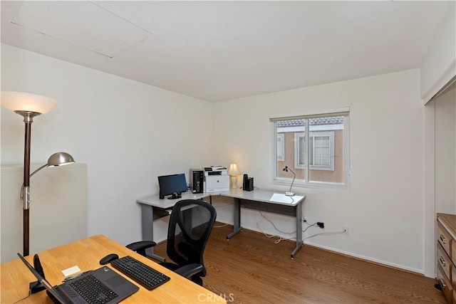 office area with hardwood / wood-style flooring