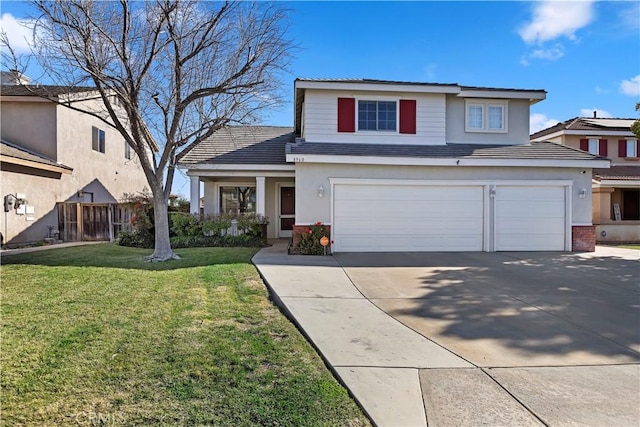 view of front property with a front yard and a garage