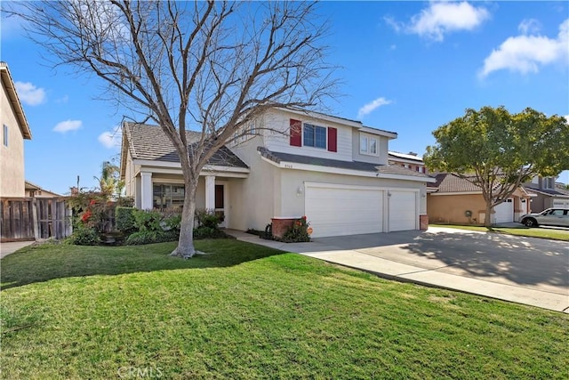 view of front property with a garage and a front lawn