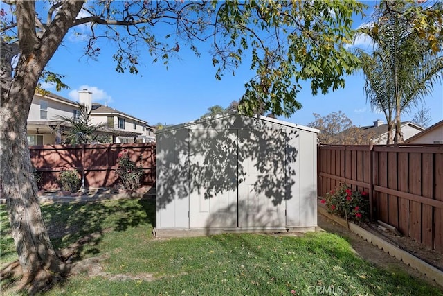 view of outbuilding with a lawn