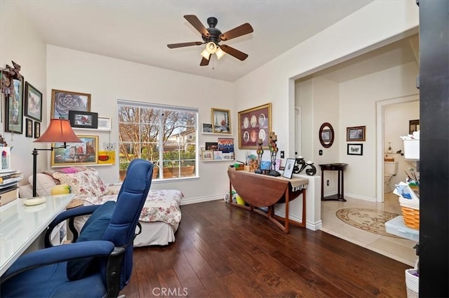 home office featuring ceiling fan and hardwood / wood-style flooring