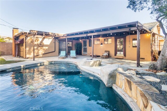 view of pool featuring a patio area