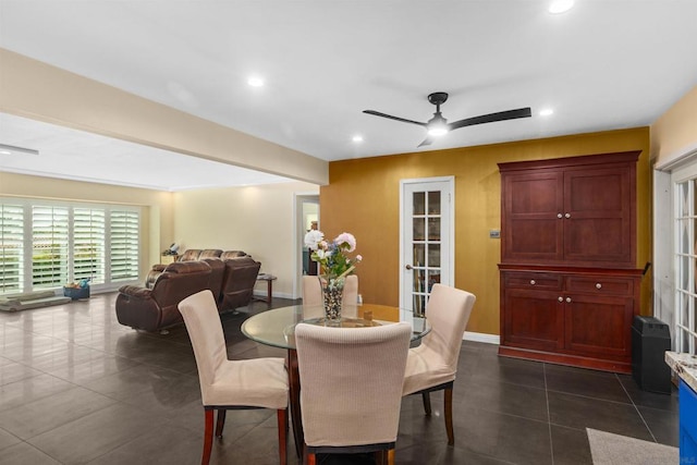 dining space featuring ceiling fan