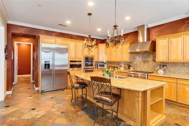 650 Crystal Mountain Cir, Riverside, CA 92506 - kitchen with stainless steel appliances, wall chimney range hood, a chandelier, decorative backsplash, and crown molding