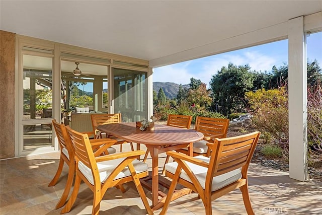 view of patio / terrace with a mountain view