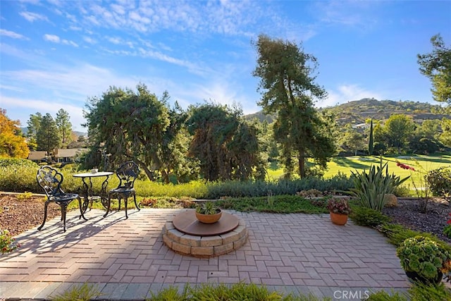 view of patio with a mountain view