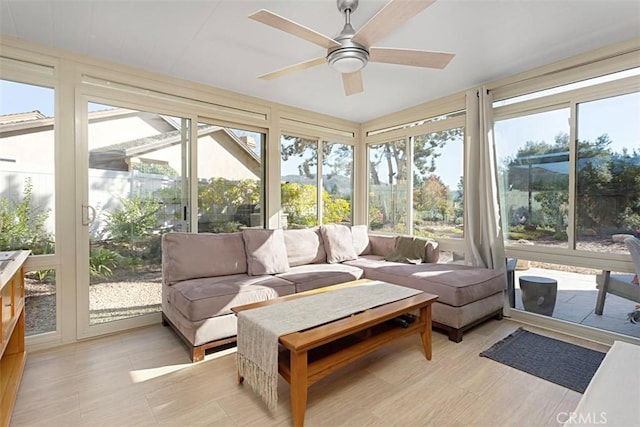 sunroom / solarium with ceiling fan