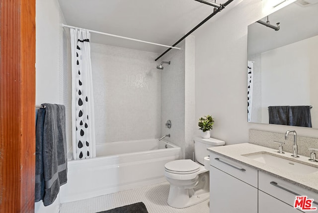 full bathroom with vanity, tile patterned flooring, toilet, and shower / tub combo with curtain