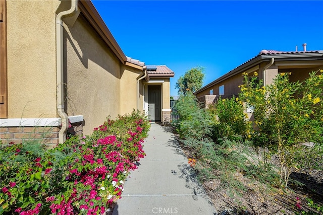 property entrance with solar panels