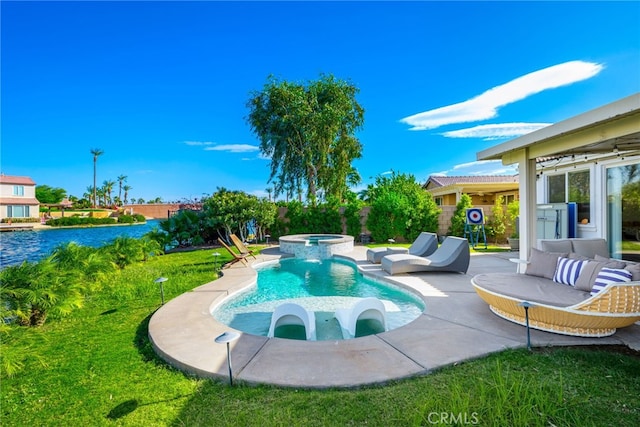 view of pool featuring a yard and an in ground hot tub