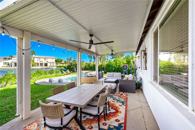 view of patio with ceiling fan and outdoor lounge area